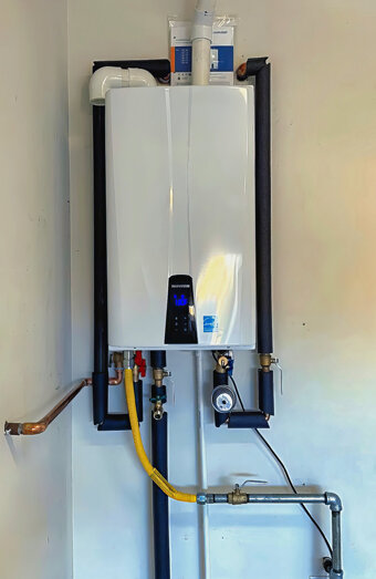 https://koondoolahotwater.com.au/uploads/2025/06/instant-hot-water-systems-63860.jpg